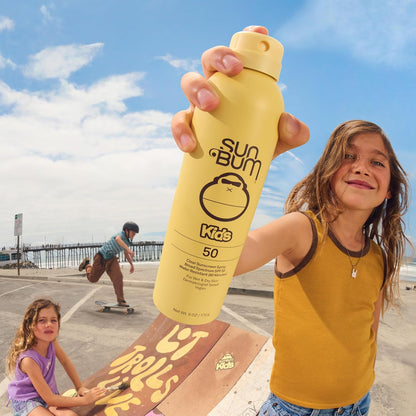 clear, non-greasy aerosol spray that applies to wet or dry skin