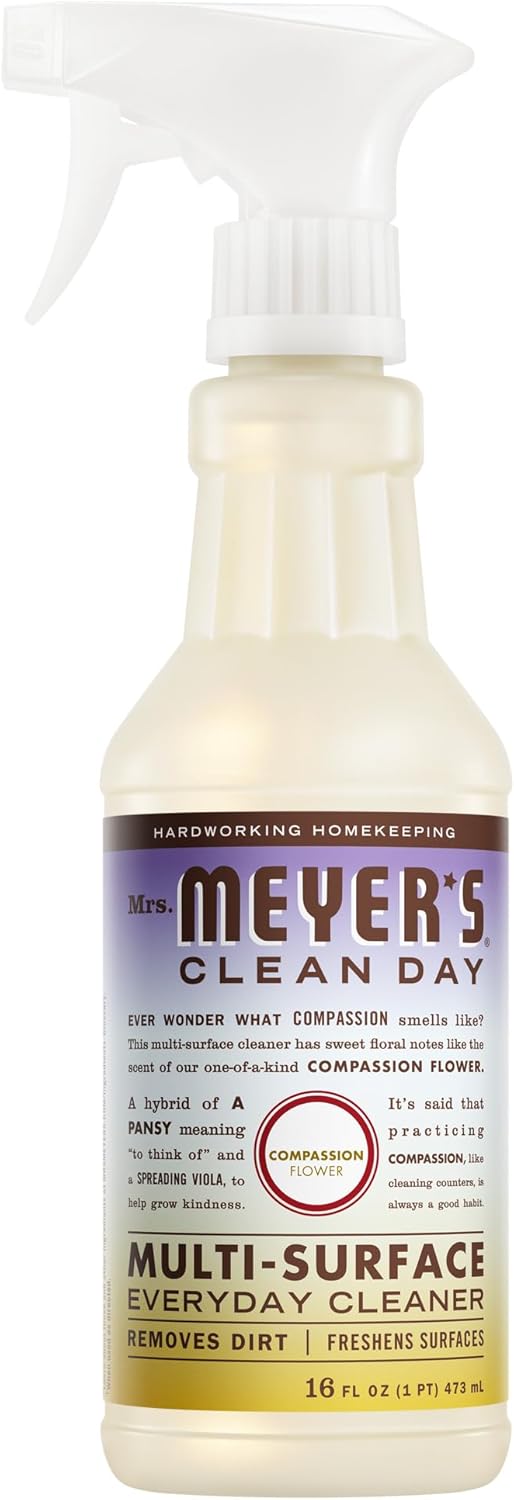 essential oil-based formulation with scent notes of sheer violet, yellow pansy, cedarwood, and lemon (compassion flower variant)