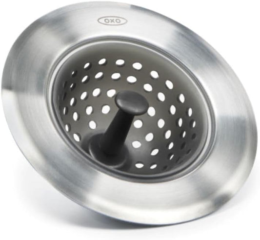 flexible stain-resistant silicone basket that inverts for debris disposal