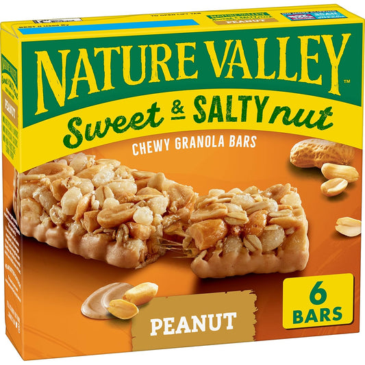 granola bar dipped in creamy peanut and almond butter coating