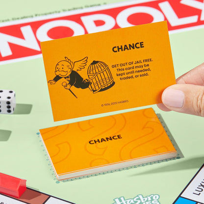 includes 'our family monopoly game records' tracker card for logging winners across sessions