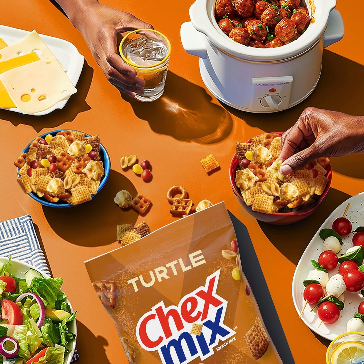 mix of multiple crunch textures (cereal pieces, pretzels, popcorn, peanuts) in every handful