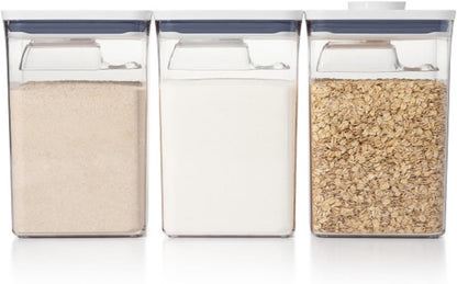 push-button airtight lid that doubles as a built-in lift handle