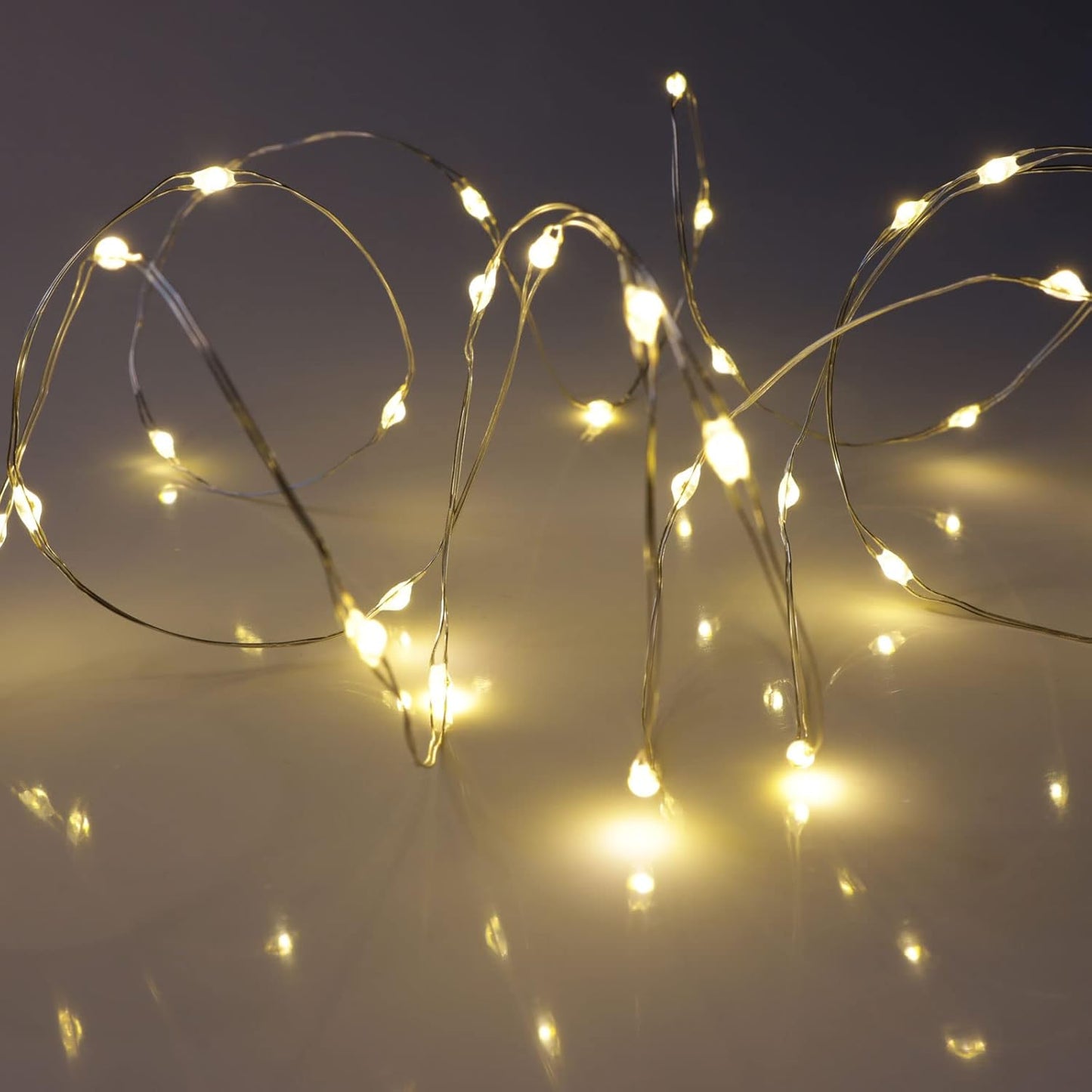 QBIS Warm White Micro LED Lights – 6.5ft Thin Silver Wire for Clean, Uncluttered Bedroom and Studio Apartment Styling