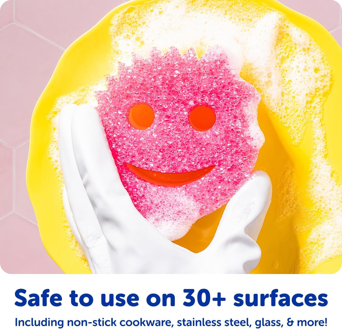 smiley face ergonomic design with eye grip points for 360-degree reach and utensil-slot mouth