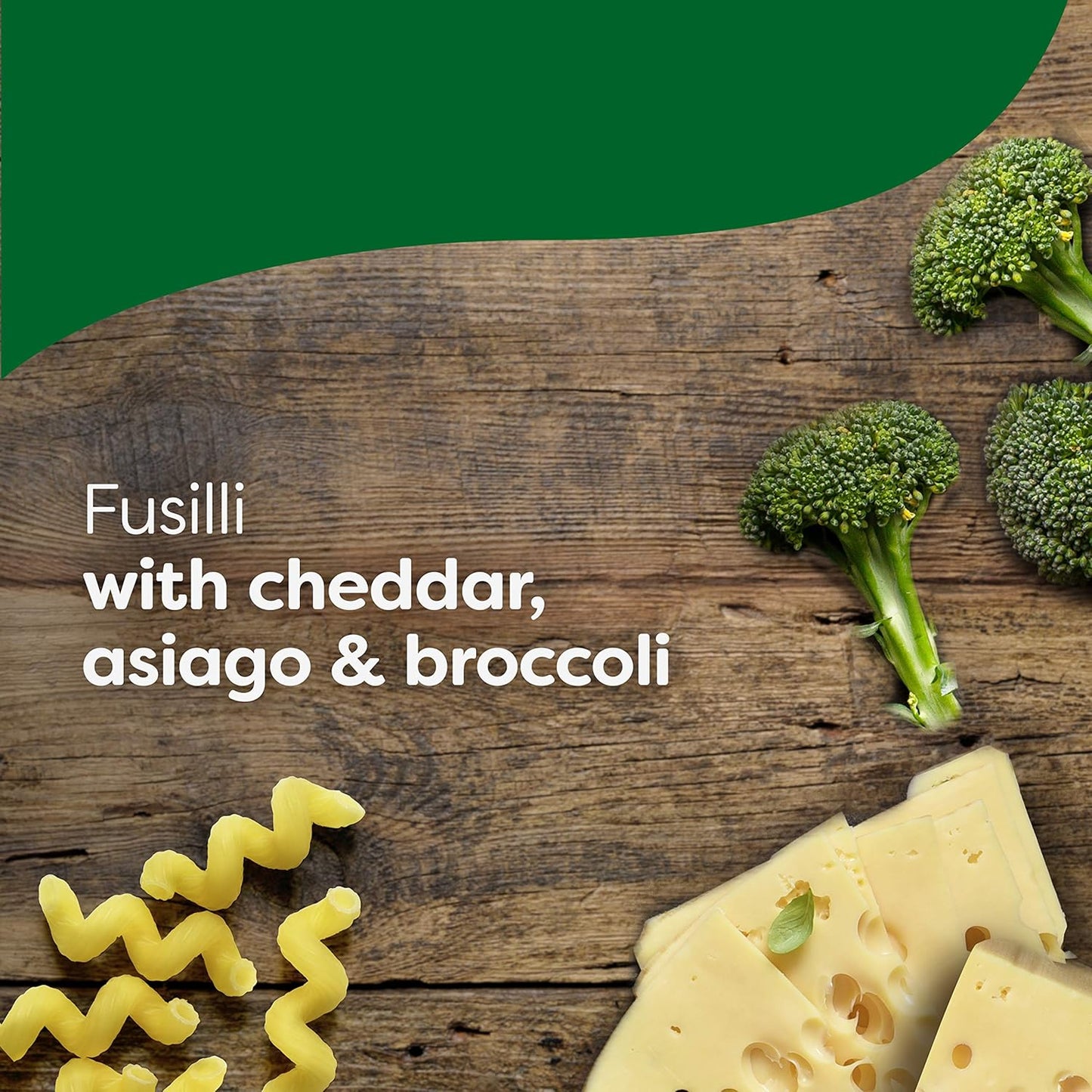 spiral pasta with broccoli florets in a creamy cheddar sauce