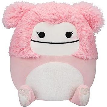 three collectible character variants: dark teal bigfoot, white bigfoot, and pink unicorn